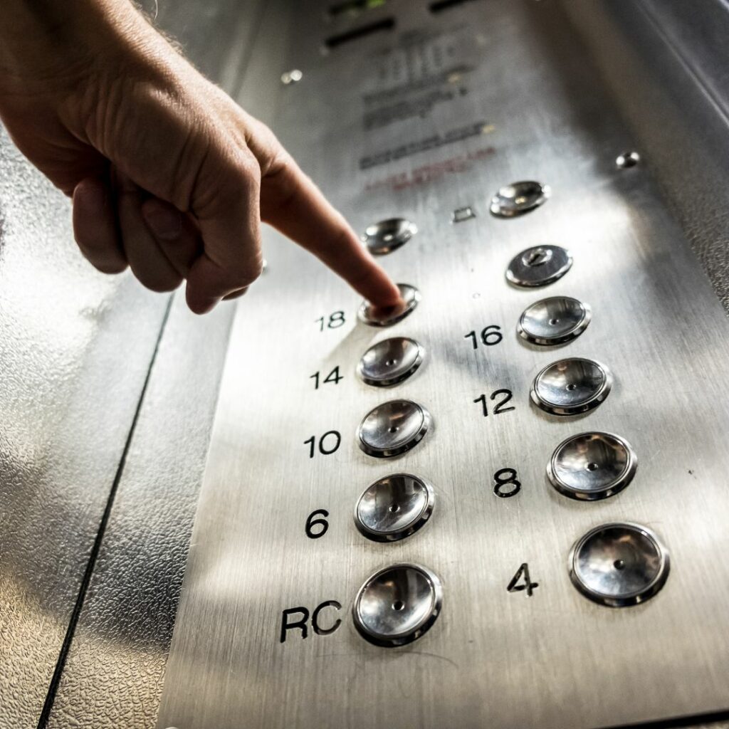 pushing 18th floor button on elevator