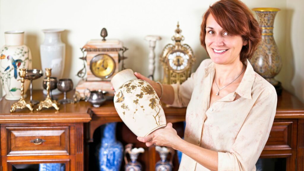 woman holding antique